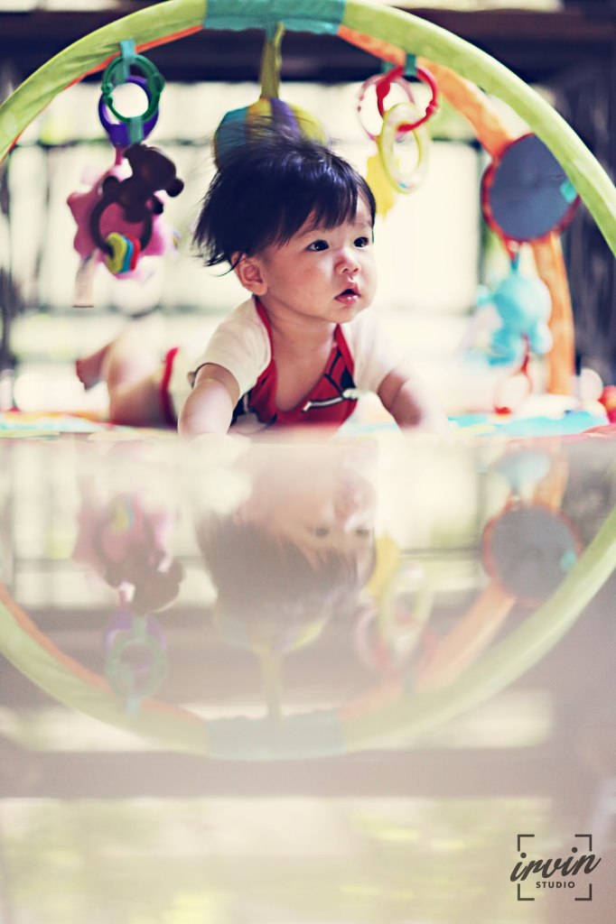 Lots of toys to keep baby occupied. Photo by Irvin Studio