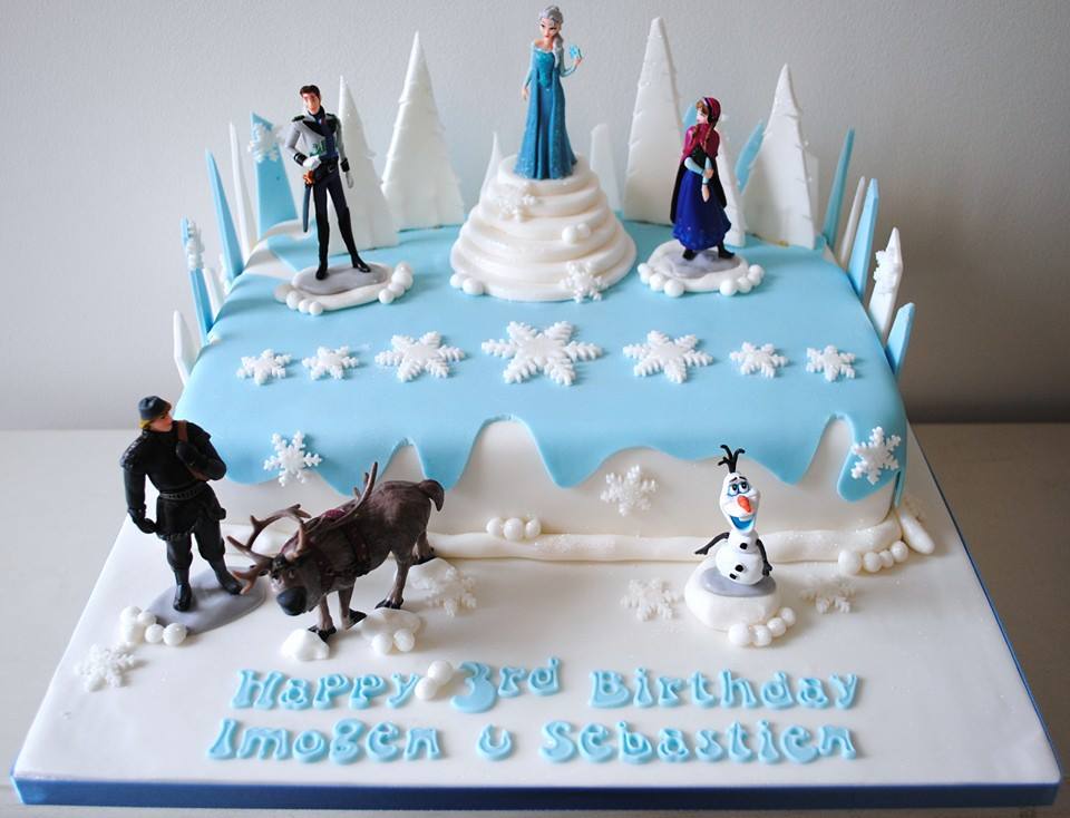 Large rectangle cake with fondant shards and Frozen toppers by Eats and Treats. Source