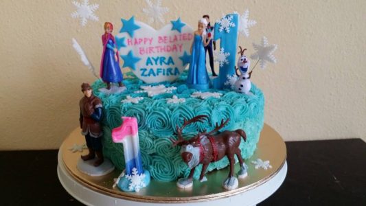 Buttercream rosettes cake with frozen theme and toppers. By Celebrate With A Cake. Source