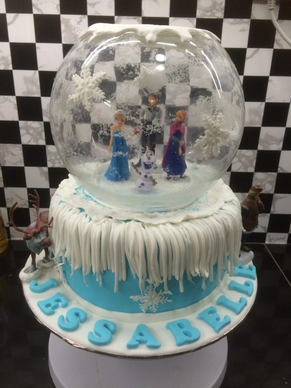Frozen theme cake snowglobe design by Shaniel Cake Artistry