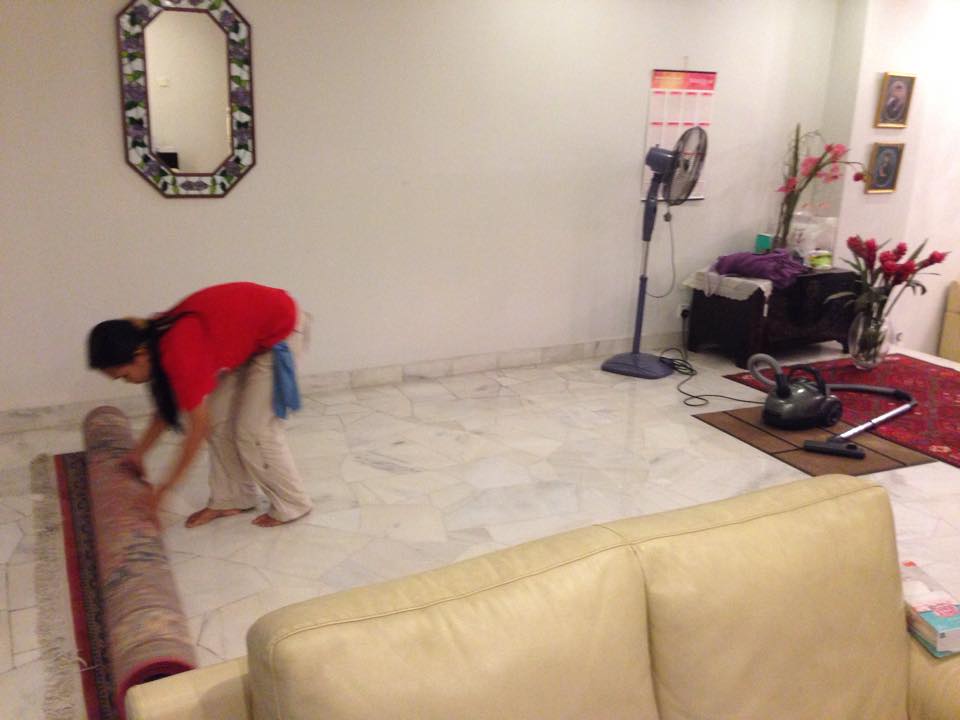 Hired cleaner cleaning a house in TTDI, KL