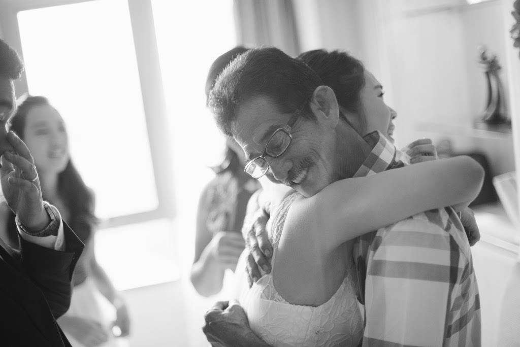 A moment with her Dad - Photo by Aaron Chin Photography