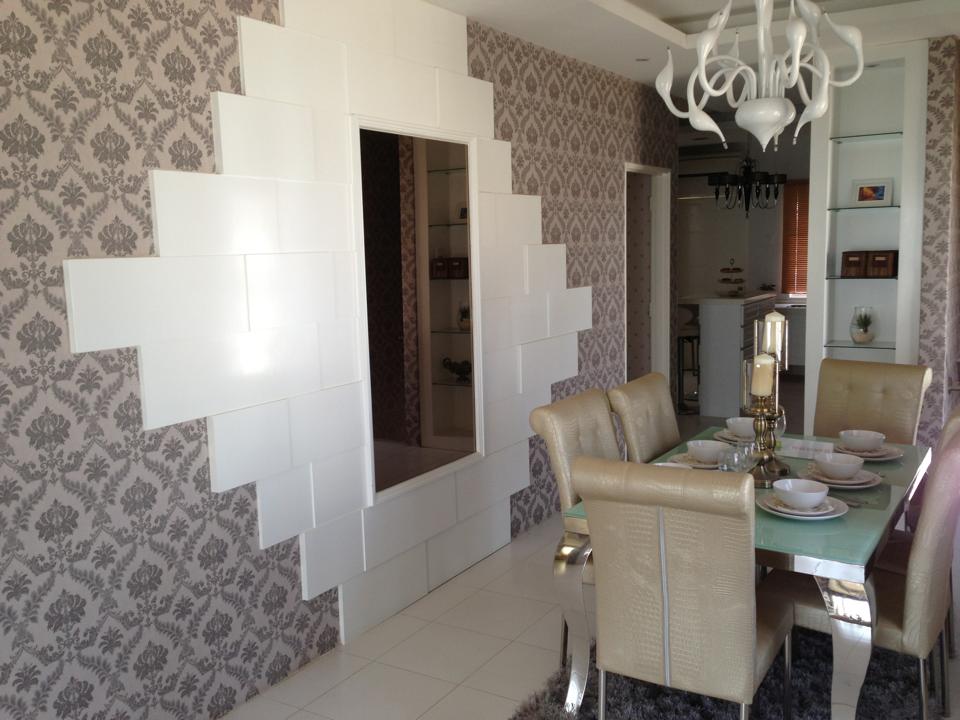Carpeting and wallpaper help muffle interior echo