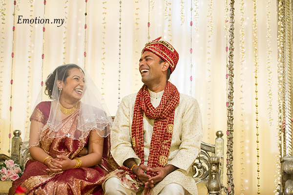 Bride and groom sitting on manavarai. Indian wedding in Malaysia. Photo by Emotion in Pictures
