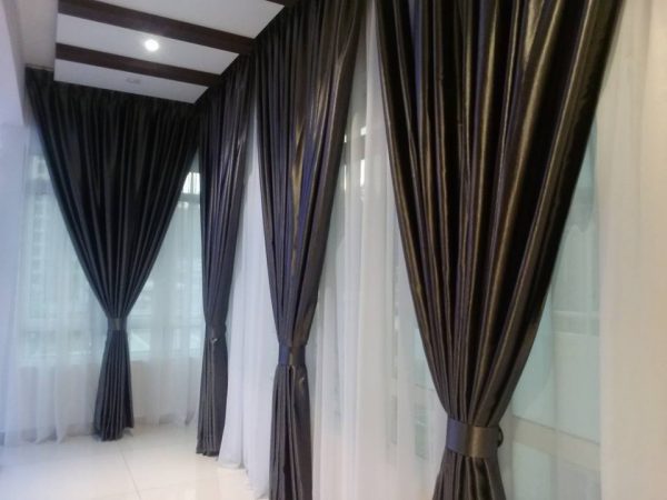 Day and night curtains for large bay windows by The Interior Enterprise. Source