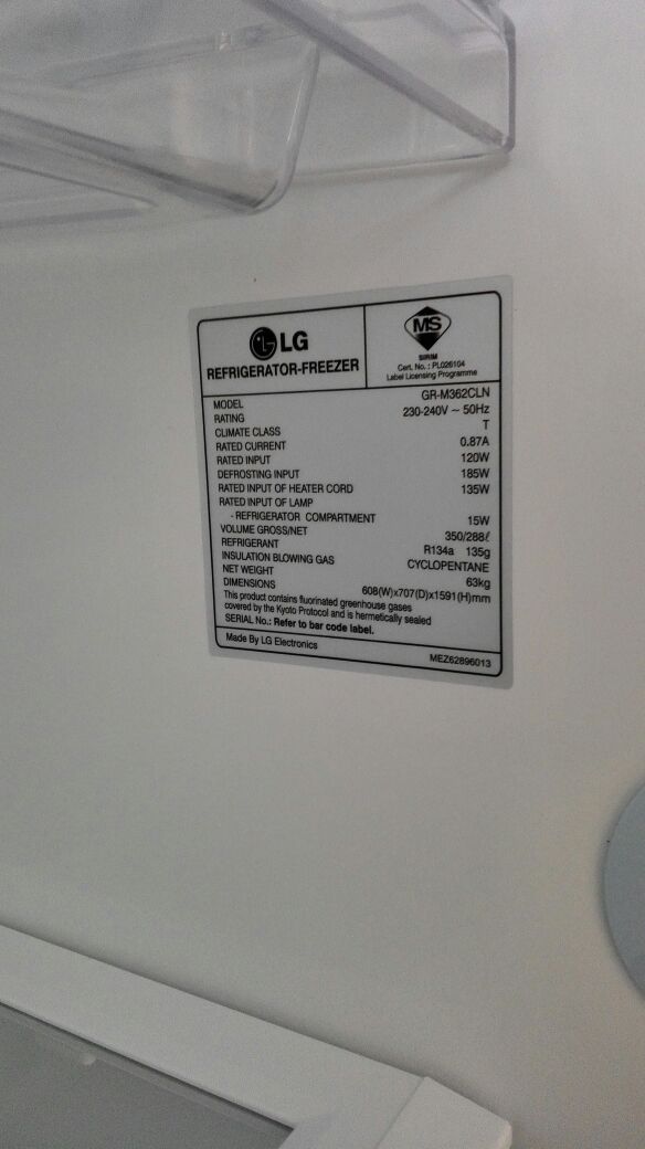 Checking the power consumption label for a fridge-freezer. Photo by Zarul's Washers & Fridges. Source. 
