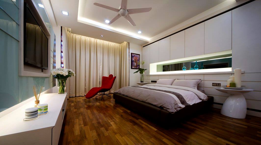 Strategically placed house plants in this bedroom design. By Design Spirits