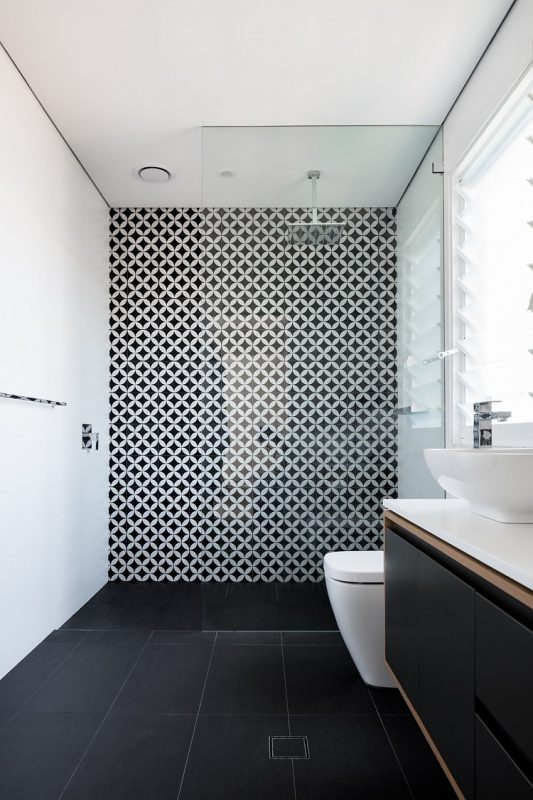 Black and white bathroom design with statement tiles in Davidson NSW. Design by Hobbs Jamieson Architecture