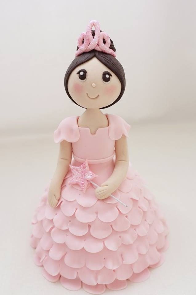 Pink doll cake with tiara and ruffles. Made by: Little House of Dreams. Order in Singapore at Recommend.sg