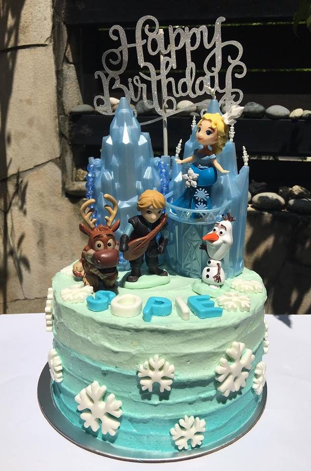 Frozen cake with Anna, Kristoff, Sven and Olaf. Made by: CATivating Cakes and Cupcakes. Order a custom-made princess cake in Singapore at Recommend.sg