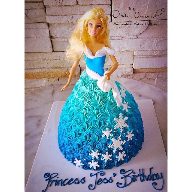 Doll princess cake based on Frozen theme.Made by: The White Ombre. Order in Singapore at Recommend.sg
