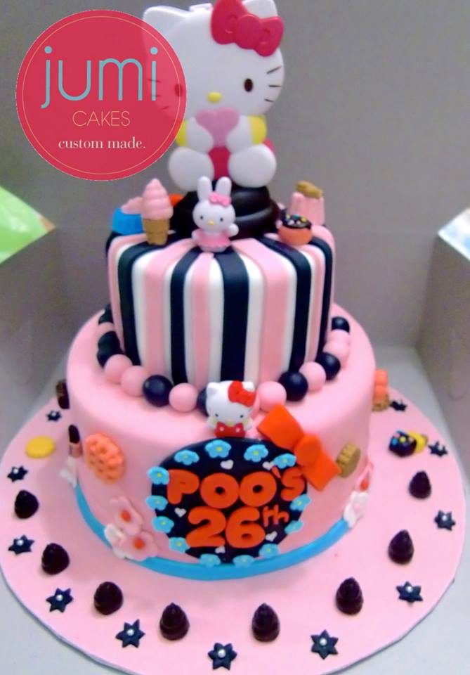 A slightly matured Hello Kitty Cake with black and pink decoration. Made by: Jumi Cakes. Source