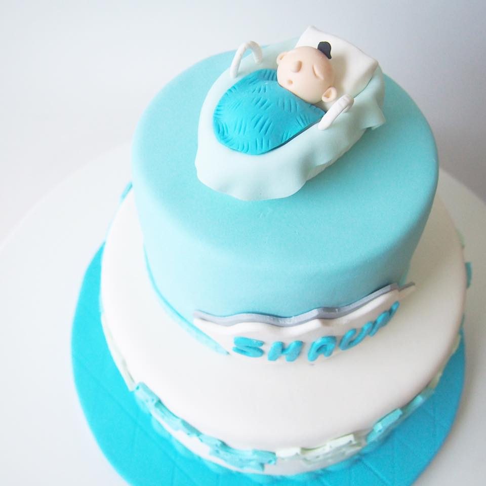 A blue themed baby shower cake. Made by: Corine and Cake Singapore - Recommend.sg