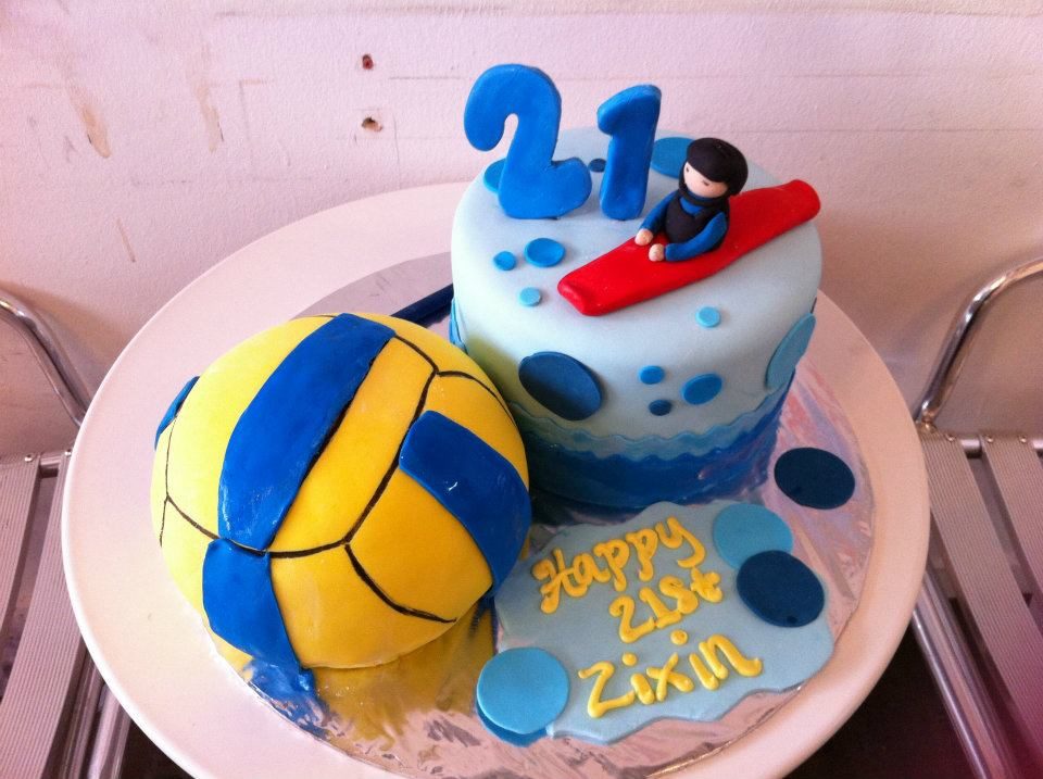 A beach and watersports-themed birthday cake. Made by: My Fat Lady Cakes and Bakes Singapore - Recommend.sg