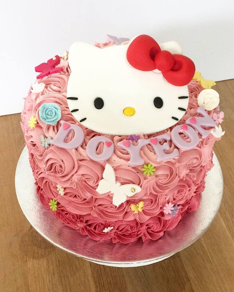 Turn any regular buttercream frosted cake into a Hello Kitty themed cake by adding a Hello Kitty fondant cutout. Made by: Oni Cupcakes. Source