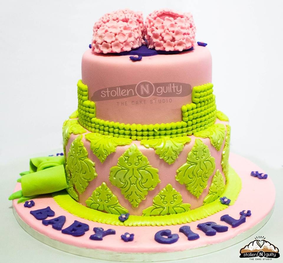 A two-tiered cake with a more matured and intricate design. Made by: Stollen N Guilty Singapore - Recommend.sg