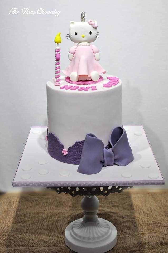 Hello Kitty cakes do not always have to be dominated with pink. By decorating it with white and grey, Hello Kitty cake can be perfect for big kids or even grown ups, too. Made by:  The Flour Chemistry .Source