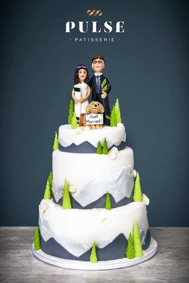 A simple yet unique wedding cake design that incorporates the personalities of the newlyweds. Made by: Pulse Patisserie.Source