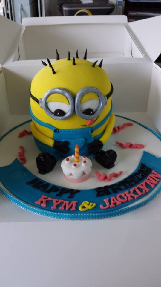 A Minion shaped cake perfect as the centrepiece on the dessert table.Made by: My Fat Lady Cakes and Bakes.Source