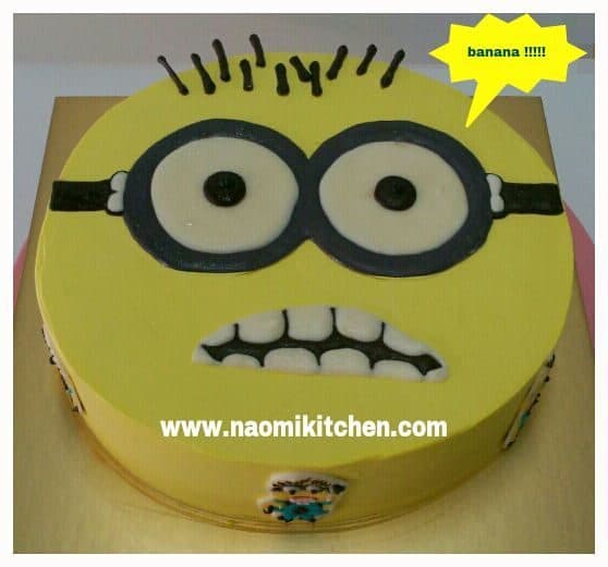 A regular round cake turned into the Minion’s face with buttercream icing, and black and white fondant for the eyes, mouth and hair. Made by: Naomi Kitchen.Source