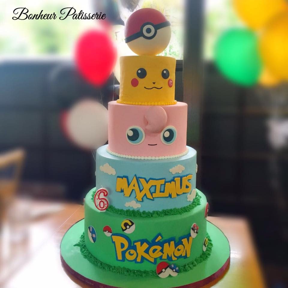 A four-tiered cake with Jigglypuff, Pikachu and Pokeball for a Pokemon themed birthday cake. Custom cake by Bonheur Patisserie.Source
