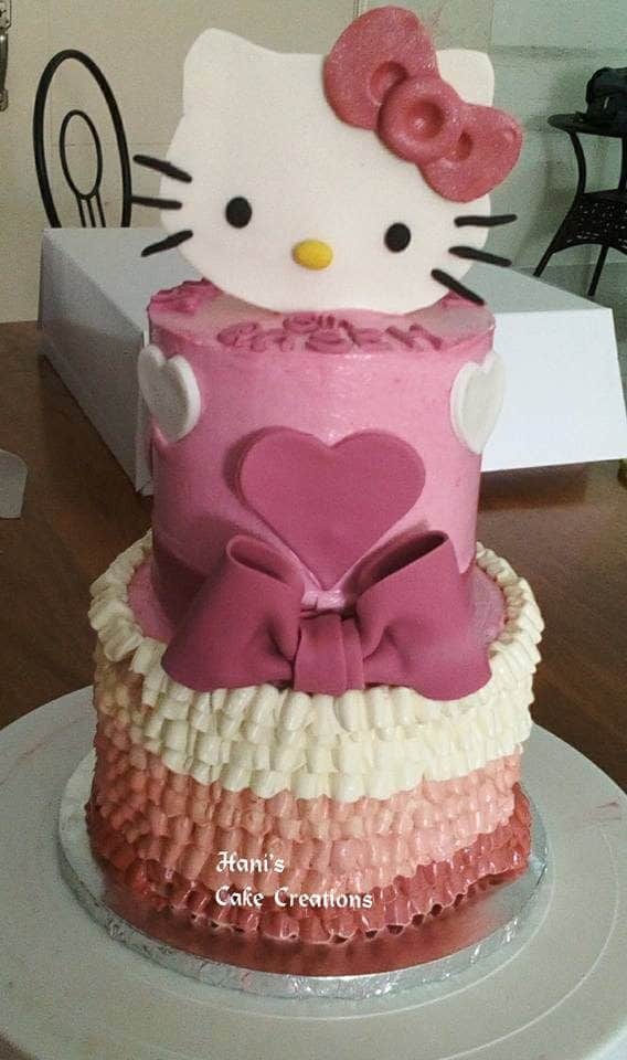 Combining fondant and buttercream for topping and icing like in this two-tiered cake decoration. Made by:  Hani's Cake Creations.Source