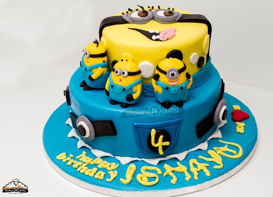 An abstract Minion themed cake with edible Minion figurines.Made by: Stollen N Guilty. Source