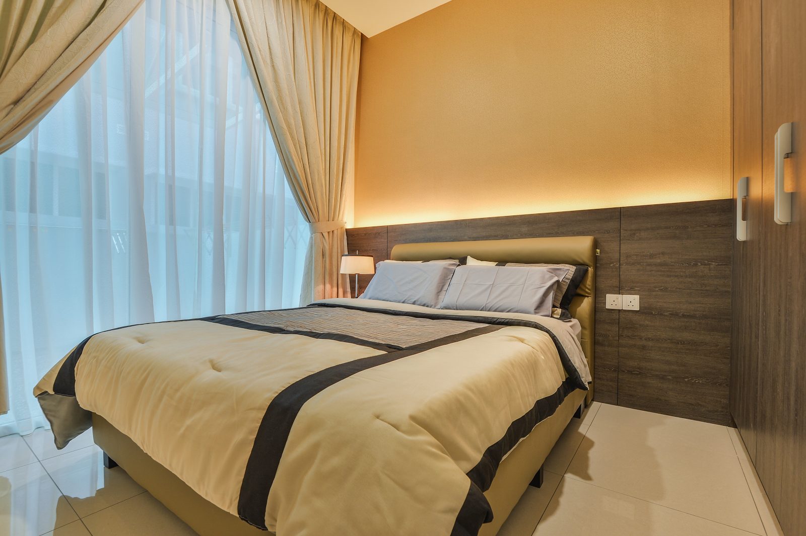 Simple bedroom design with half-height wood panelling in Cheras, Kuala Lumpur