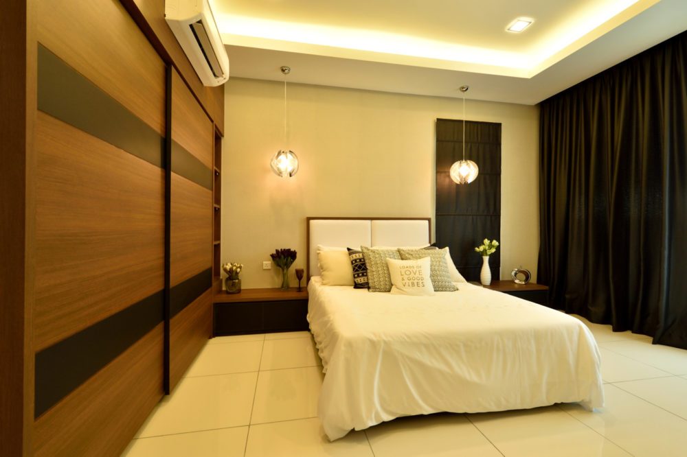 Combined wardrobe and bedside table with cove ceiling lights for this condominium in Serene Residence RT2, Rawang