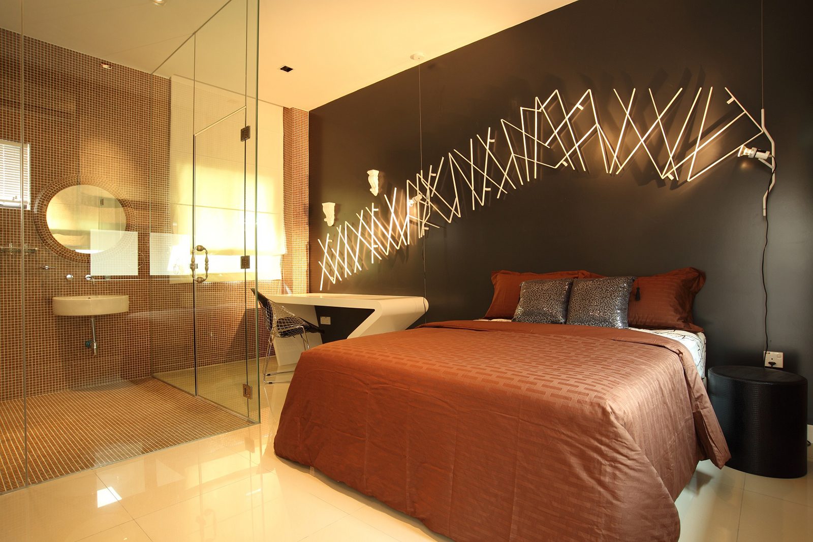 Modern bedroom with see-through shower in this bungalow in Desa Park City
