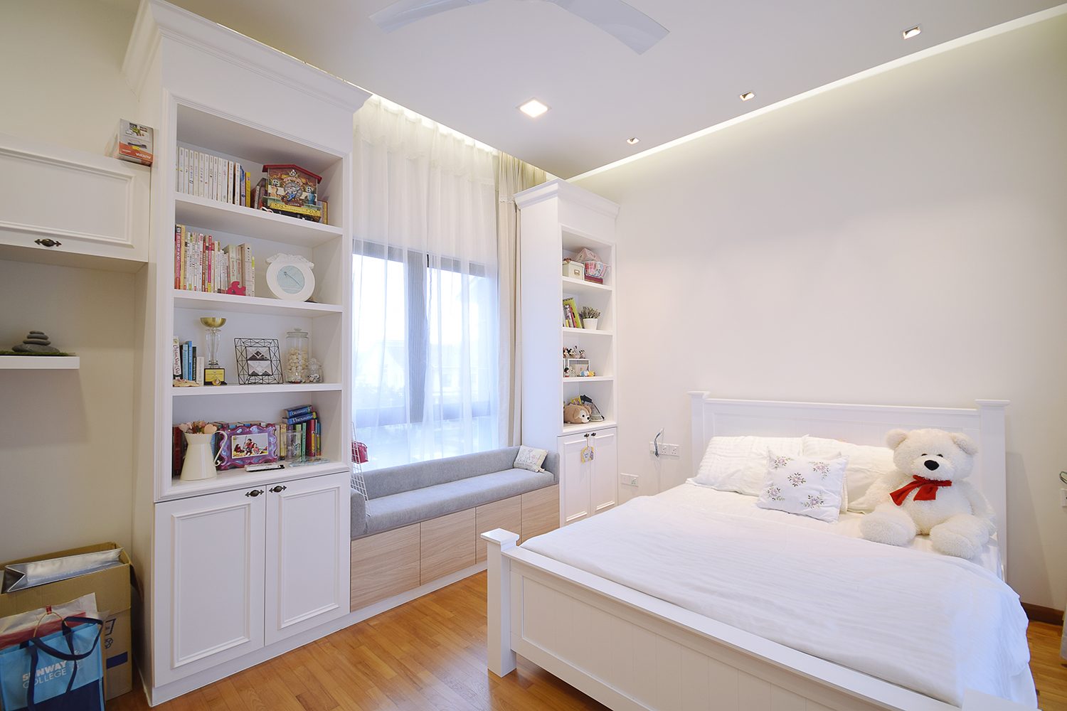Clean and white kids bedroom with bay window reading area in Kajang Jade Hill