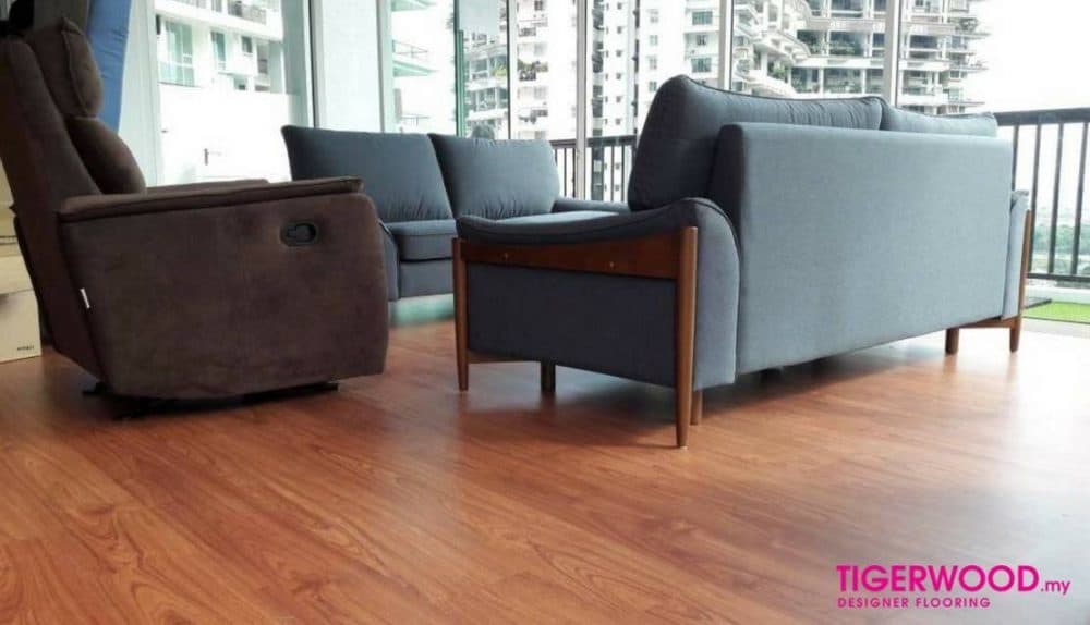 Laminate flooring can withstand heavy furniture. Photo by Tigerwood