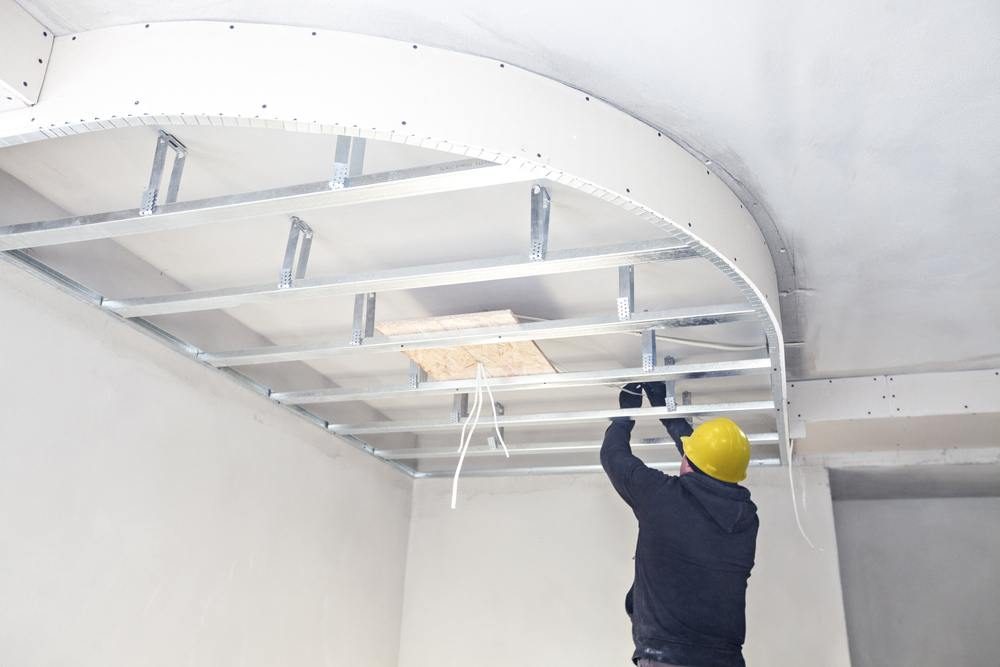 Plaster ceiling curved design being added